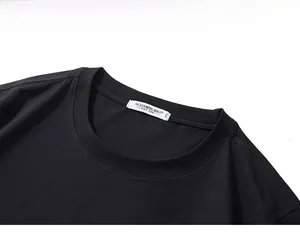 Détail du col d'un t-shirt noir 3XL montrant la texture du tricot et l'étiquette