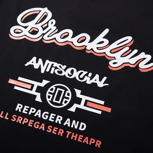 Oversized black cotton T-shirt featuring bold Brooklyn and Antisocial graphic prints