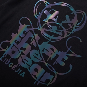 T-shirt nera oversize in cotone con stampa olografica a forma di orso in stile graffiti