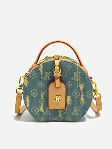 Mini borsa rotonda in denim blu retrò con finiture in pelle e dettagli dorati