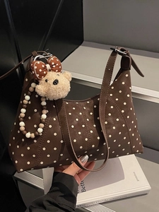 Borsa a tracolla marrone a pois con orsetto di peluche e catena di perle elegante
