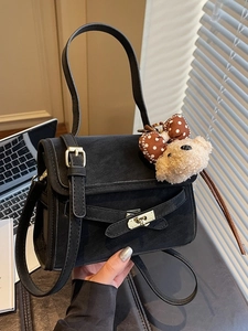 Classic black matte leather shoulder bag with metal lock and cute bear charm pendant
