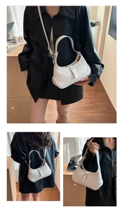 Three-way view of white hobo bag with geometric texture, silver buckle, and adjustable strap