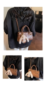 Detailed views of brown vintage handbag with plush rabbit charm and crossbody strap