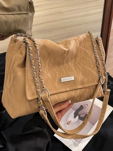 Borsa tote vintage caramello con trama marmorea e tracolla a catena argentata