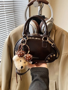 Vintage dark brown glossy semi-circle pillow bag with elegant plush bear pendant charm