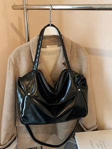 Minimalist black glossy leather large capacity tote bag with wide shoulder straps