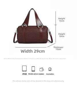 Detailed size specifications and large capacity display for the burgundy woven pillow bag