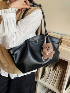 Black vintage pleated tote bag with plush bear charm, minimalist large shoulder bag