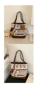 Close-up of retro wool tote bag with floral pattern and decorative plush bear charm