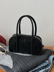 Classic black Boston handbag with matte texture and silver zipper for casual daily styling