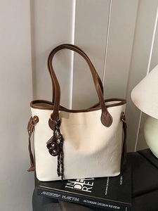 Retro large capacity tote bag in cream and dark brown contrast with woven pendant detail