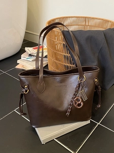 Vintage large capacity dark brown PU leather tote bag with unique charms on books