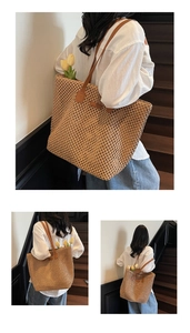 Detailed close-up of woven mesh texture and premium brown leather handles on straw tote bag