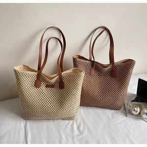Detailed comparison of beige and coffee woven tote bags with elegant leather handles