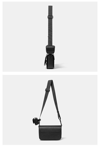 Detail view of black Saffiano leather crossbody bag with adjustable wide nylon strap