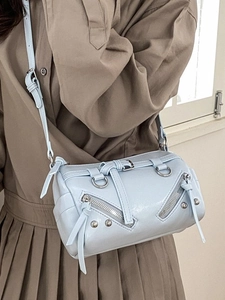 Vintage light blue cylinder motorcycle tote bag with silver rivets and zippers