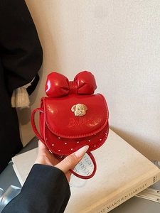 Petit sac bandoulière rouge pour enfant avec nœud papillon et pois blancs