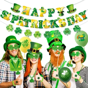 St. Patrick's Day party set with clover glasses, banners, and photo props for fun celebration