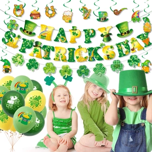 St. Patrick's Day party decoration set with shamrock balloons, banners and festive props