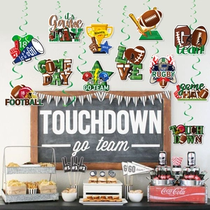 American football party swirl decorations with rugby helmets and trophies for game day events