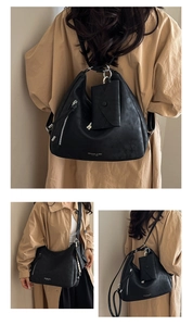 Détail du grand sac cabas noir en cuir avec zip latéral et pochette amovible assortie