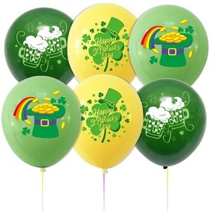 Macro view of St. Patrick's Day latex balloons with clover and gold hat patterns