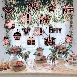 50th birthday party hanging swirls with rose gold 1976 and vintage themed cardstock