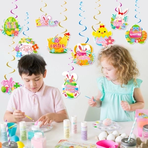 Easter party ceiling decorations featuring colorful swirls and cartoon bunny egg cutouts