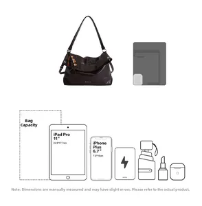 Detail of dark brown leather tote bag capacity showing 11 inch iPad Pro storage space