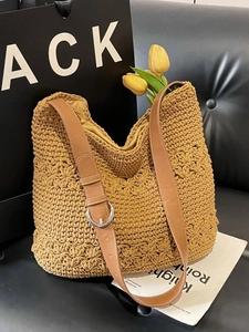 Hollow straw shoulder tote bag with brown leather strap and floral crochet texture