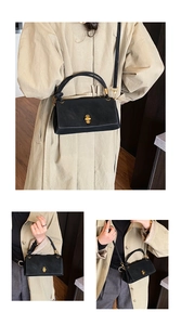 Three-way view of a black vintage crossbody square bag showing hand-carry and shoulder styles