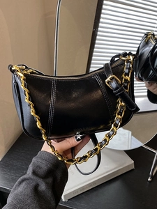 Vintage waxed leather underarm bag with gold chain and vertical stitching detail