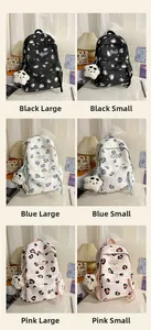 Sac à dos en toile en noir, bleu et rose montrant une comparaison de grande et petite taille