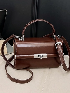 Dark brown glossy leather small square handbag with silver metal lock and top handle
