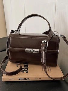 Brown patent leather handbag with silver metallic lock and detachable strap for women
