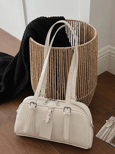 Minimalist beige Boston handbag in premium faux leather with adjustable dual straps