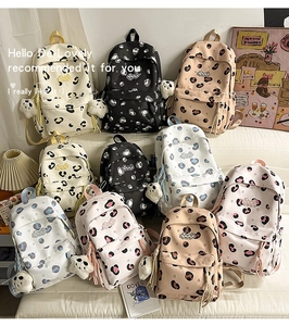 Détails des sacs à dos scolaires colorés avec motifs cœur léopard et panda