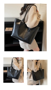Détail du grand sac cabas noir en cuir ciré vintage avec boucle argentée et texture chic