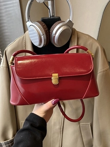 Minimalist wine red patent leather baguette shoulder bag with gold metal buckle