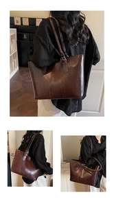Détail du grand cabas marron foncé en cuir brillant avec bandoulière réglable chic