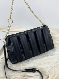 Chic black pleated square crossbody bag with decorative pearl gold chain and leather strap