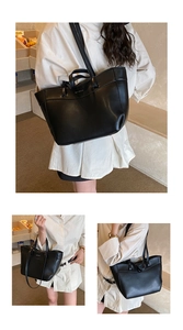 Three-view layout of black leather tote bag showing handle, strap, and large capacity