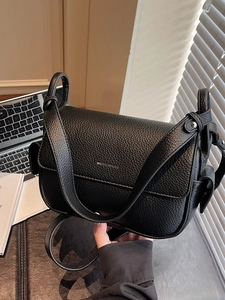 Black lychee leather shoulder bag with wide strap for office and casual wear
