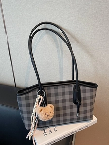 Large capacity checkerboard tote bag with black leather straps and bear charm