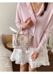 Pink plaid handbag featuring a cartoon cat pattern and a cute 3D bunny pendant detail