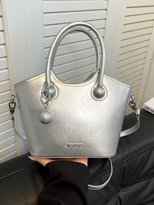 Silver matte trapezoid bucket bag with top handle and detachable shoulder strap