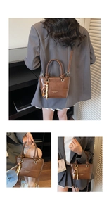 Detail view of caramel brown bucket bag with braided knots and colorful beaded charm