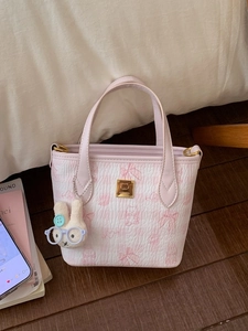 Pink checkered underarm bag with cute kitten embossing and rabbit plush charm