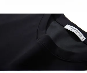 Close-up of black cotton T-shirt neckline featuring 5XL size label and knit texture